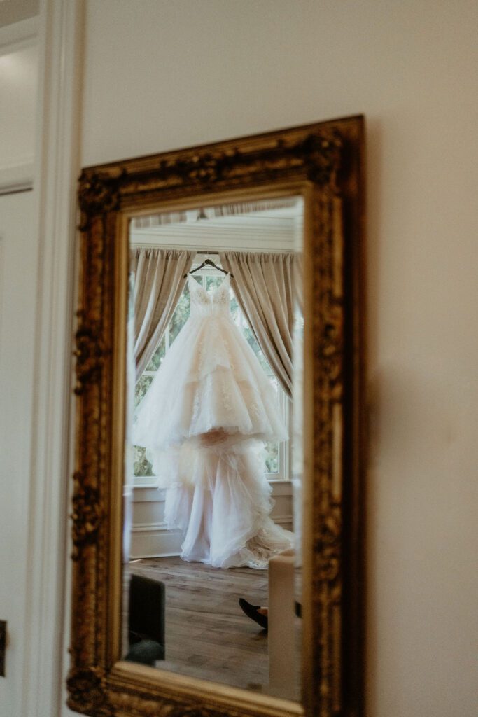 Wedding Dress reflection in the mirror. Romantic Wedding Photography